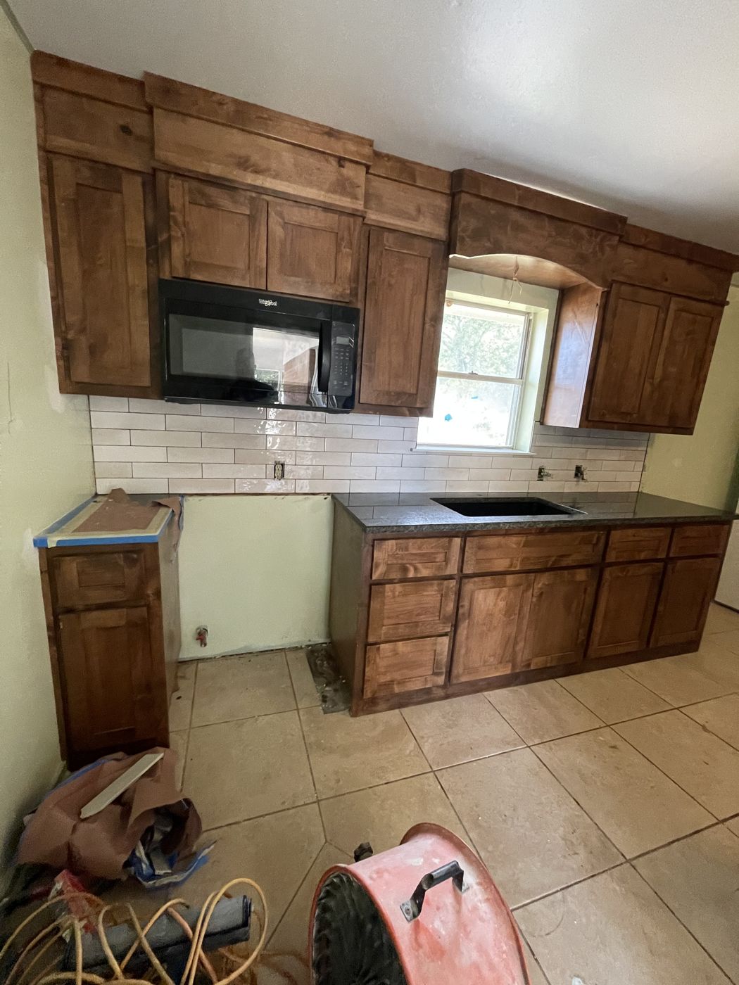 D&D Rustics kitchen renovation with stained wood cabinets